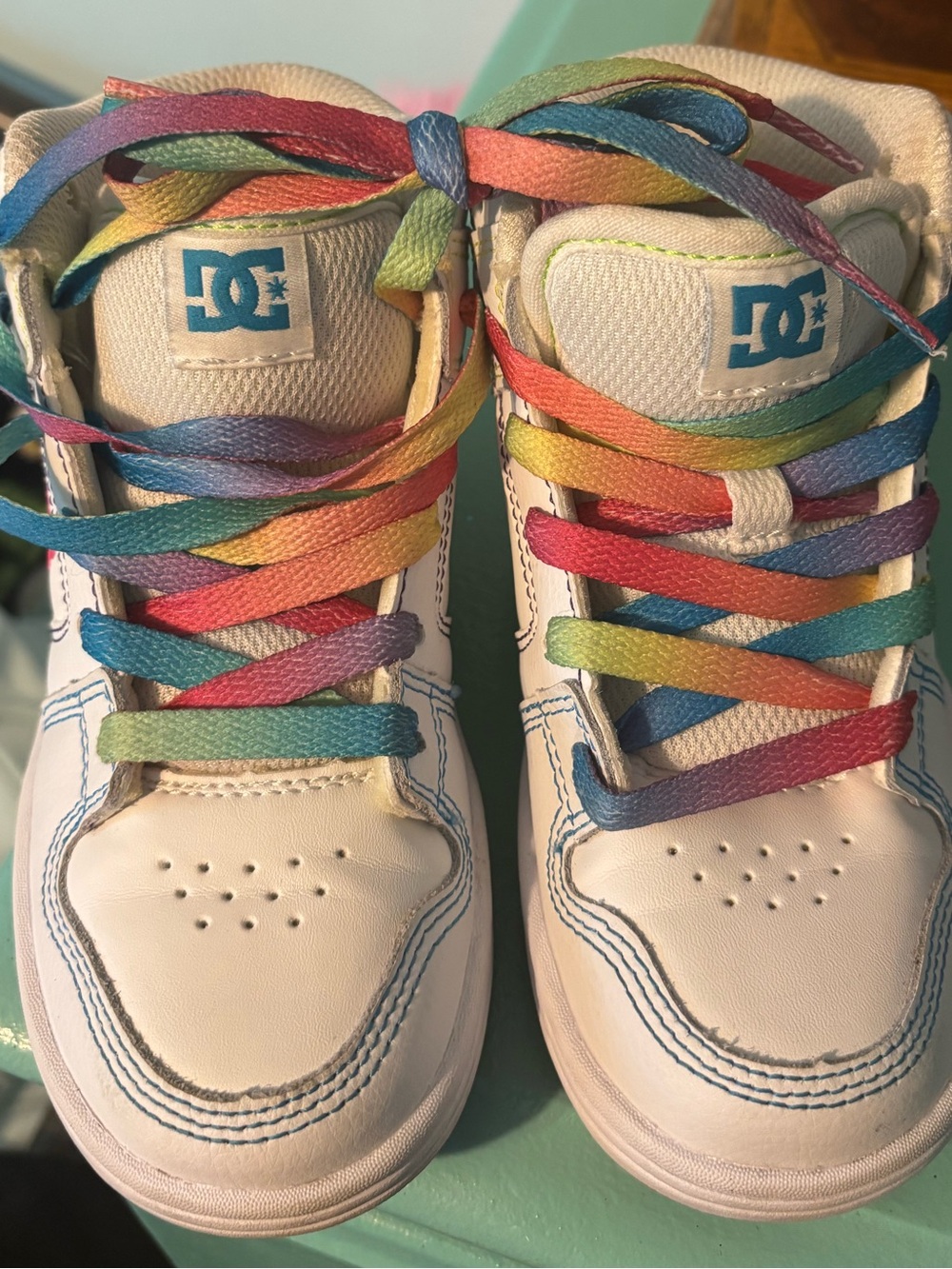 DC Kids White Sneakers with multi-colored Laces